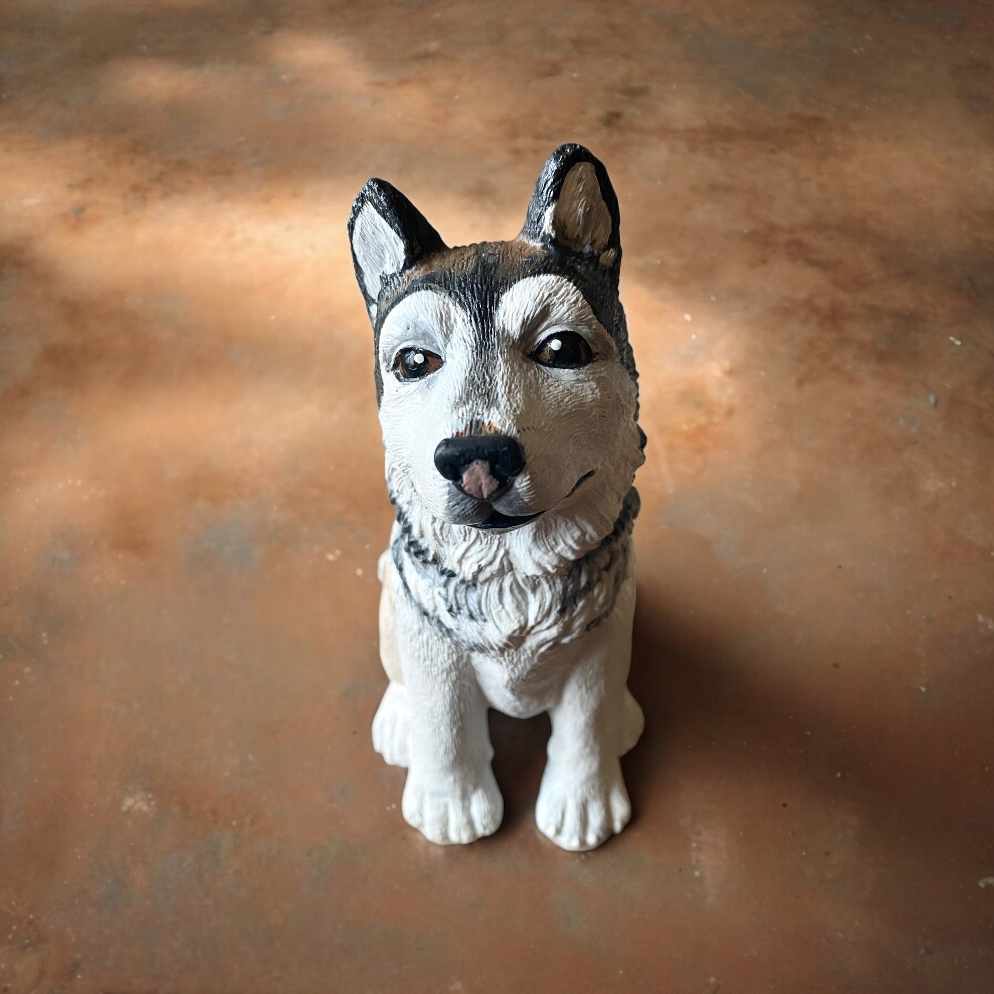 Pet Portrait Dog Husky Malemute Custom Statue pet memorial of husky named Ares. The husky statue is white, brown and gray.